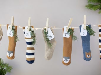 Ideas for Advent calendars: using 24 socks for a fantastic last-minute Advent calendar. Ideas for Advent calendars: using 24 socks for a fantastic last-minute Advent calendar.