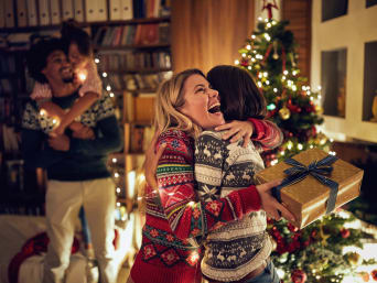 Christmas traditions: A family celebrating Christmas together. Christmas traditions: A family celebrating Christmas together.