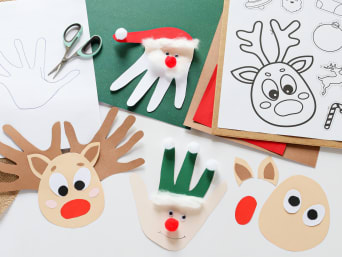 Christmas crafts with children: craft materials and ready-made Christmas figures made from handprints. Christmas crafts with children: craft materials and ready-made Christmas figures made from handprints.