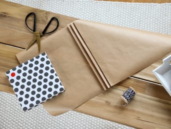 Beautiful gift wrapping: Preparation for gift wrapping with a ‘pleated look’. Beautiful gift wrapping: Preparation for gift wrapping with a ‘pleated look’.
