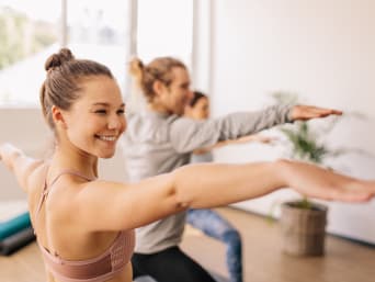 Yoga for beginners - a group in yoga class. Yoga for beginners - a group in yoga class.
