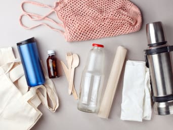 Zero waste shopping: reusable crockery and cloth bags to reduce disposable packaging. Zero waste shopping: reusable crockery and cloth bags to reduce disposable packaging.