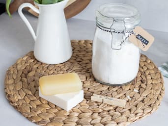 Homemade laundry detergent in a glass clip top jar. Homemade laundry detergent in a glass clip top jar.
