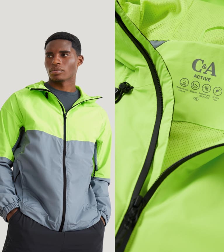 Layering functional clothing: a man wearing a hardshell jacket as a weatherproof layer.