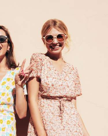 Three women in colorful summer dresses (Image source: halayalex - stock.adobe.com) Three women in colorful summer dresses (Image source: halayalex - stock.adobe.com)