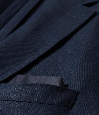Suit fabrics: a close-up shot of a linen suit.