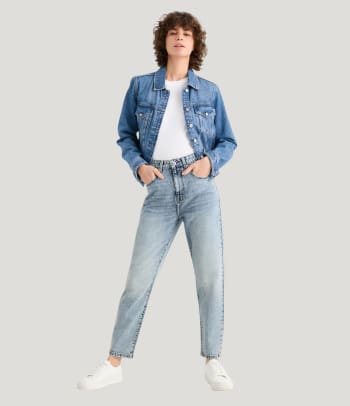 Who should wear mom jeans – a woman wearing a pair of mom jeans.