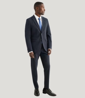 A suit is a great office party outfit for men.