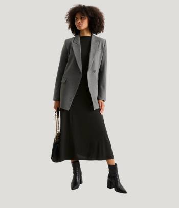 A Christmas dress for an office party: an elegant, knitted dress.