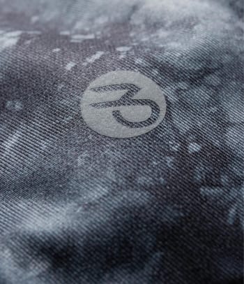 A close-up of functional clothing with a percentage of elastane.
