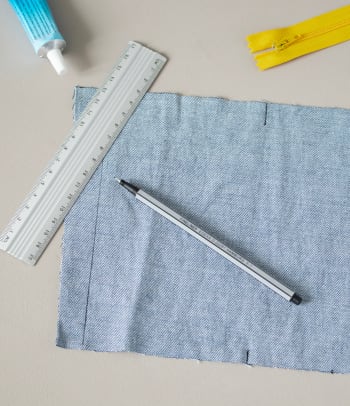 Upcycling jeans: marking the centre fold and the seam allowance.