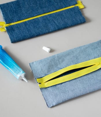 Upcycling ideas for jeans: glueing the shorter sides together.