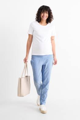 Pantaloni de stofă pentru gravide - cu fronseuri