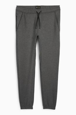 Pantaloni de trening funcționali