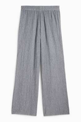 Plissé trousers - high-rise waist - wide leg