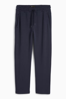 Pantaloni de trening funcționali