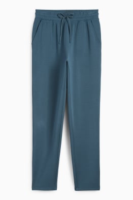 Pantaloni funcționali