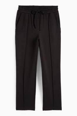 Pantalon en jersey - mid waist - tapered fit