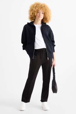 Pantalon en jersey - mid waist - tapered fit