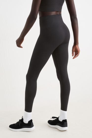 Femei - Colanți sport - protecție UV - negru