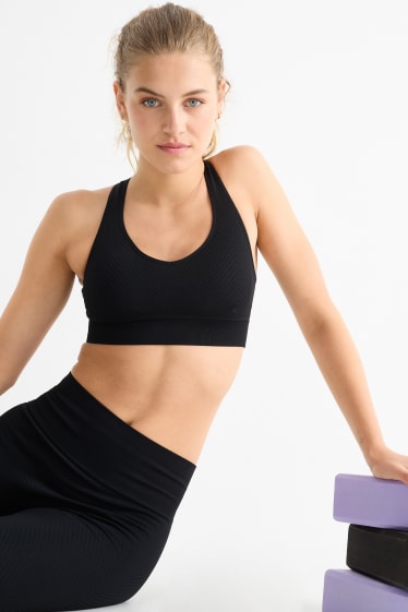 Women - Sports bra - padded - textured - UV protection - black