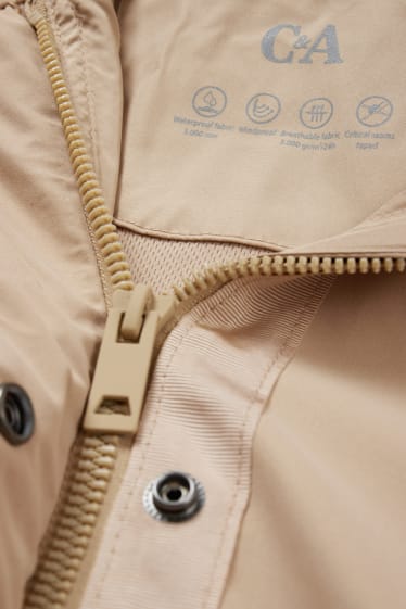 Damen - Regenjacke mit Kapuze - wasserdicht - beige