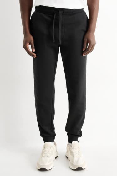 Bărbați - Pantaloni de trening - negru