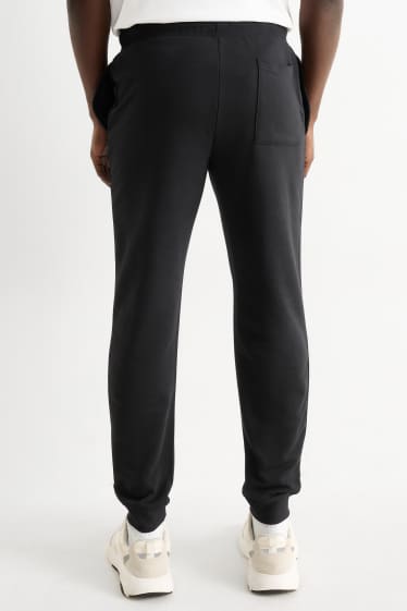 Bărbați - Pantaloni de trening - negru