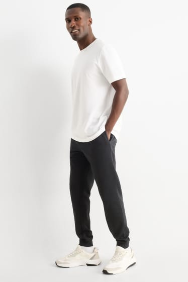 Bărbați - Pantaloni de trening - negru