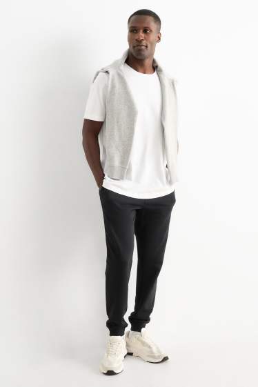 Bărbați - Pantaloni de trening - negru