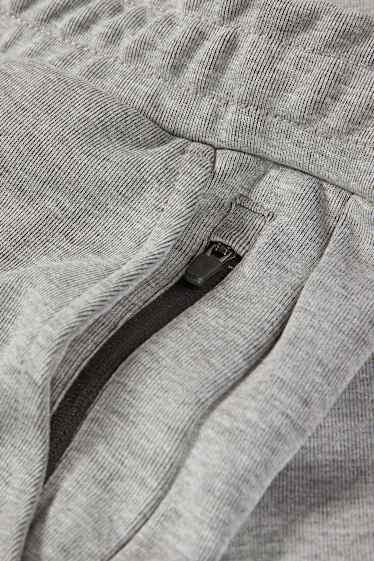 Bărbați - Pantaloni de trening funcționali - gri deschis