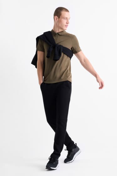 Bărbați - Pantaloni de trening funcționali - negru