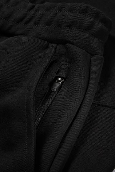 Bărbați - Pantaloni de trening funcționali - negru