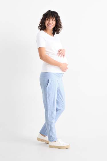Femei - Pantaloni de stofă pentru gravide - cu fronseuri - albastru deschis