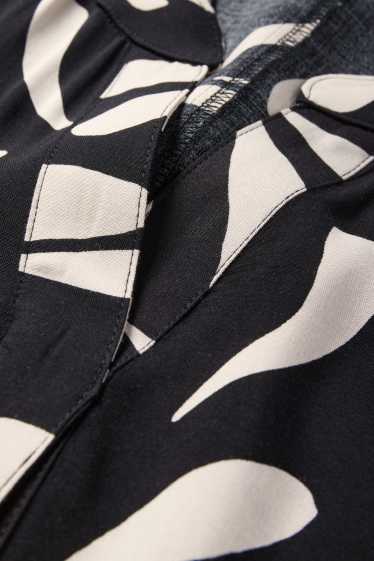 Femei - Rochie din viscoză cu decolteu în V - cu model - negru / nej