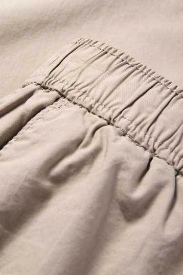 Femei - Pantaloni de stofă - talie medie - tapered fit - bej