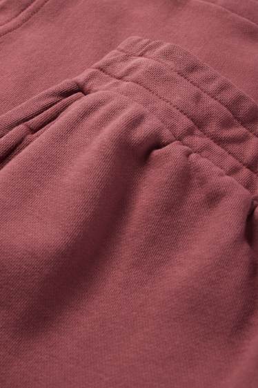 Dámské - Teplákové kalhoty - tmavě růžová