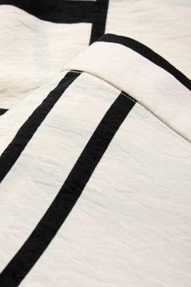 Femei - Pantaloni de stofă - talie înaltă - wide leg - cu model - alb / negru