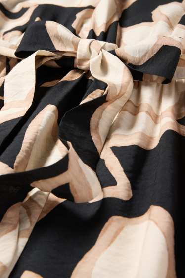 Dámské - Šaty fit & flare - s květinovým vzorem - černá/béžová