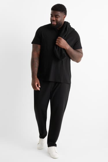 Bărbați - Pantaloni de trening - negru