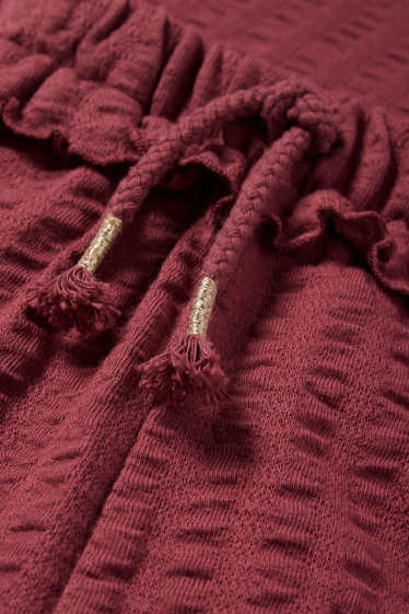 Nena - Pantalons de punt - texturats - marró vermellós