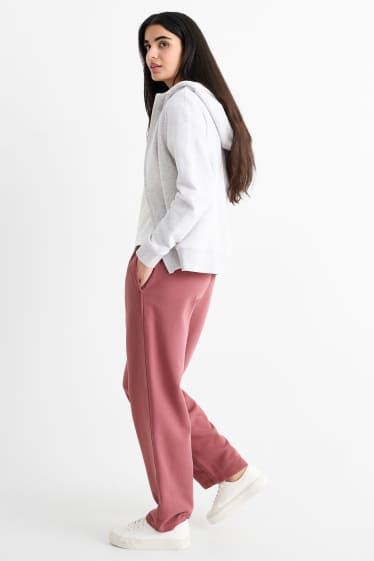 Dámské - Teplákové kalhoty - tmavě růžová