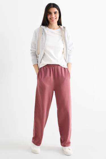 Dámské - Teplákové kalhoty - tmavě růžová