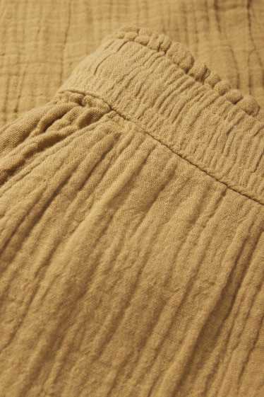 Femei - Pantaloni de stofă - talie medie - comfort fit - structurați - galben muștar
