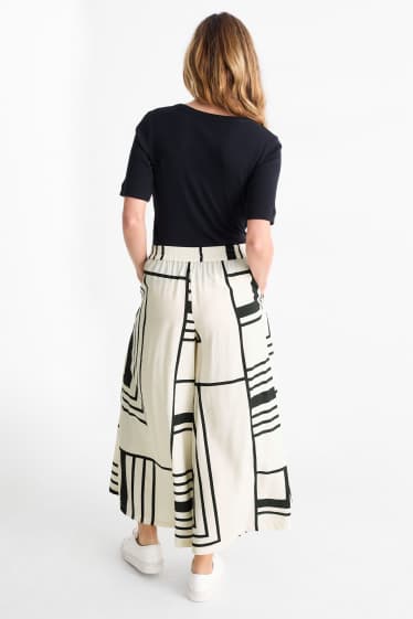 Femei - Pantaloni de stofă - talie înaltă - wide leg - cu model - alb / negru