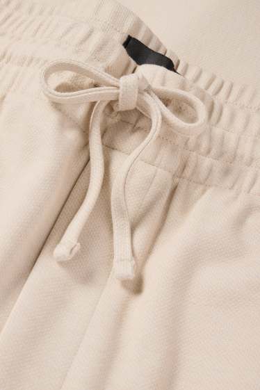 Bărbați - Pantaloni de trening - bej deschis