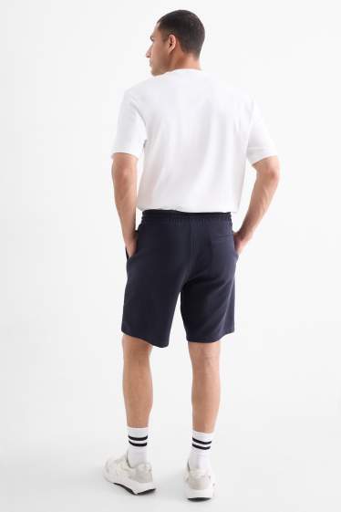 Bărbați - Pantaloni scurți de trening - structurați - albastru închis