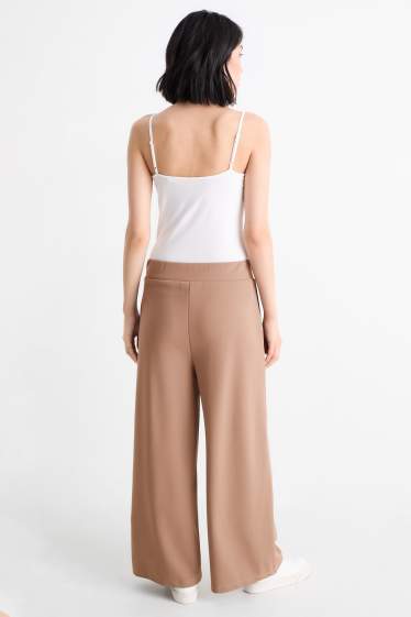 Femei - Pantaloni din jerseu - talie medie - palazzo - maro deschis