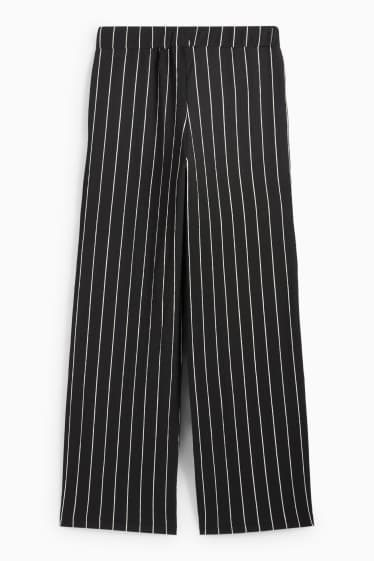 Femei - Pantaloni din jerseu - talie medie - loose fit - cu dungi - negru / alb
