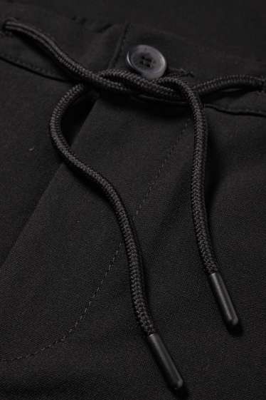 Men - Chinos - tapered fit - black